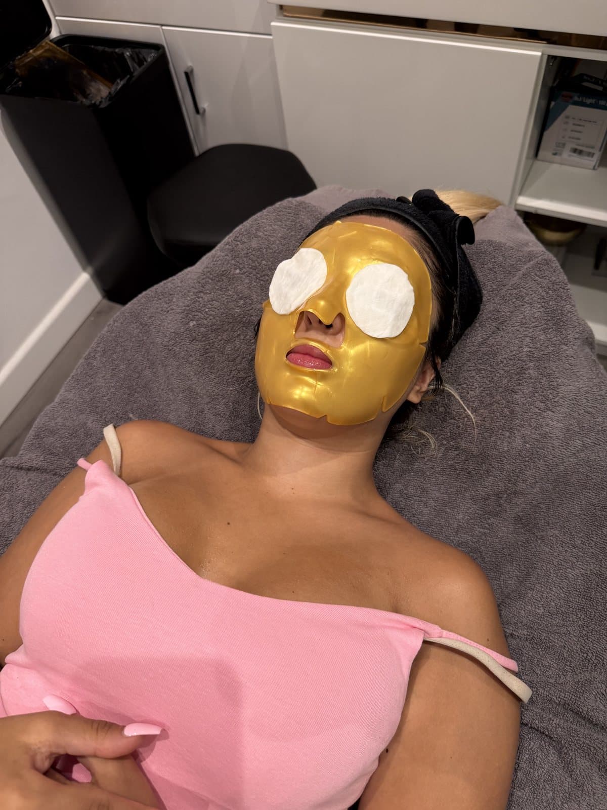A gold facial mask treatment at SKN Luxe Manchester